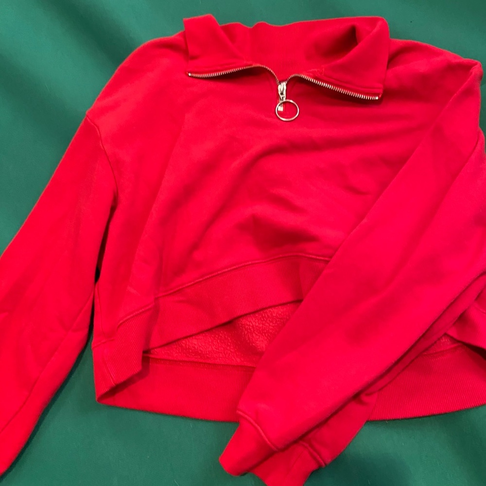 H&M divided red zip cropped sweatshirt. Size S.